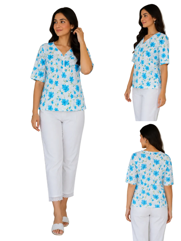 A woman modeling a white short-sleeve blouse with a blue floral print and white cropped pants, shown in a main front view and two smaller side views (front and back) against an indoor backdrop with a plant and wooden door.