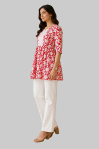 Vastraanii Women's Red Floral Cotton Peplum Kurti with White Lace Yoke & Tie-Up Back